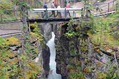 30 Water Gushing Under Bridge Over Maligne Canyon Near Jasper.jpg